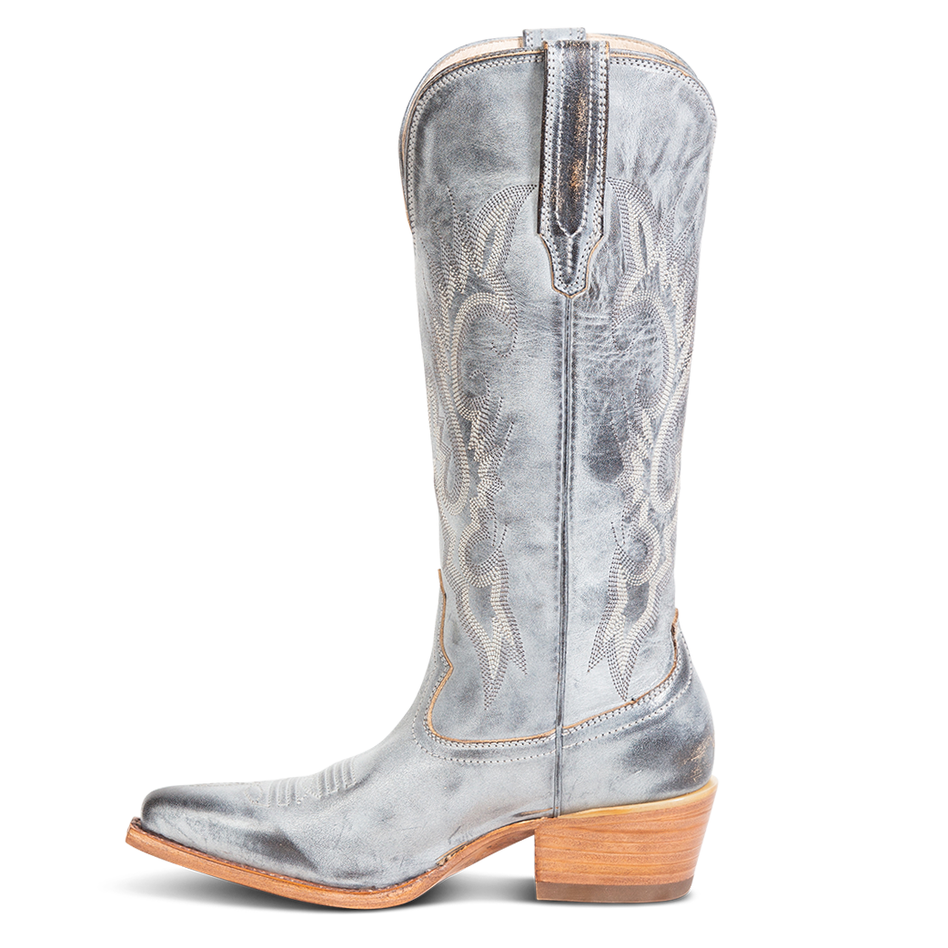 Side view showing leather pull straps and western stitch detailing on FREEBIRD women's Woodland ice leather boot