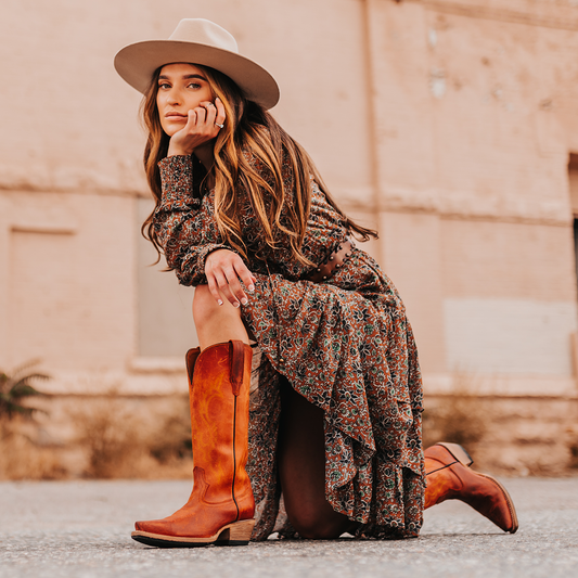 FREEBIRD women's Woodland rust suede cowboy boot with stitch detailing and snip toe construction lifestyle image