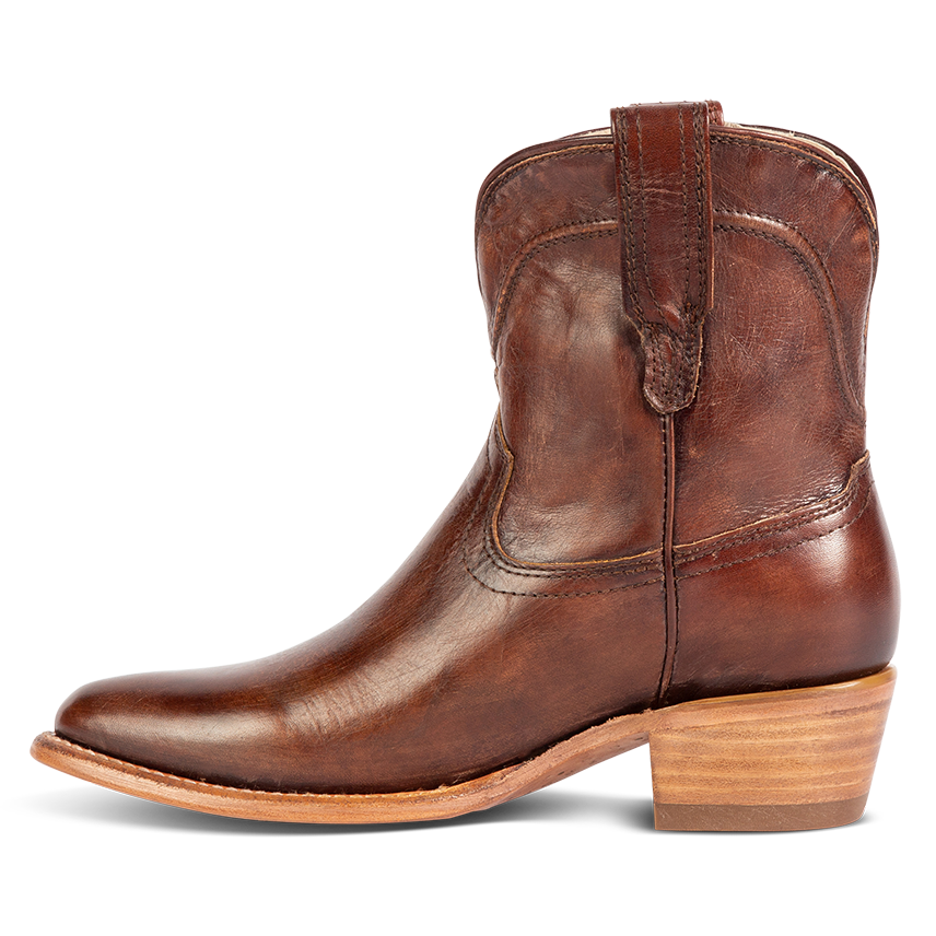Side view showing leather pull straps and scallop detailing on FREEBIRD women's Zamora cognac leather bootie