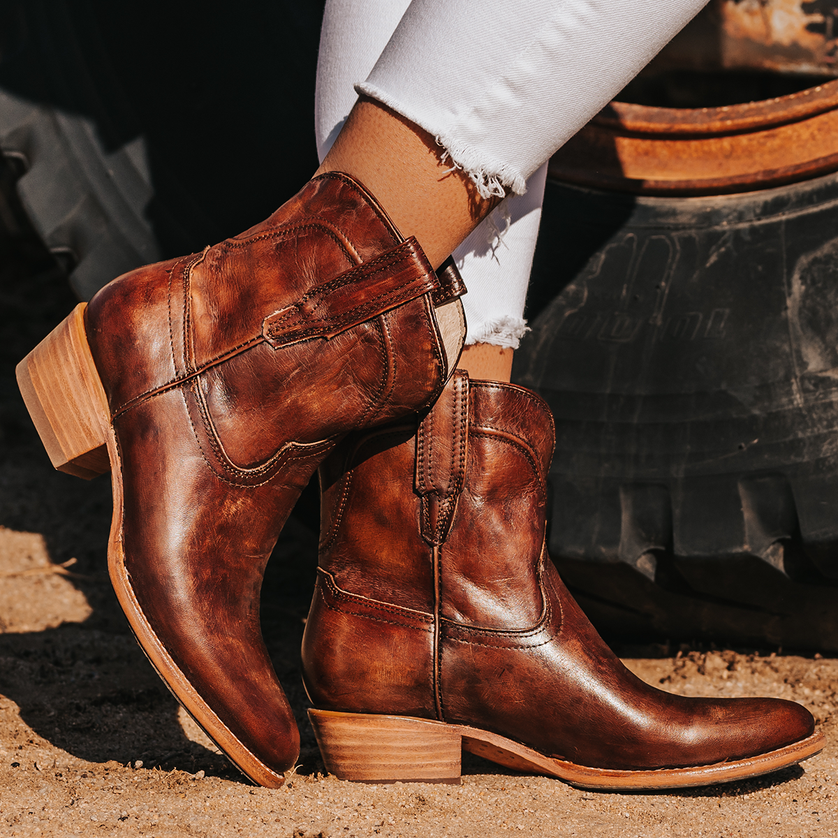 FREEBIRD women's Zamora cognac leather bootie with scallop detailing and pointed toe construction