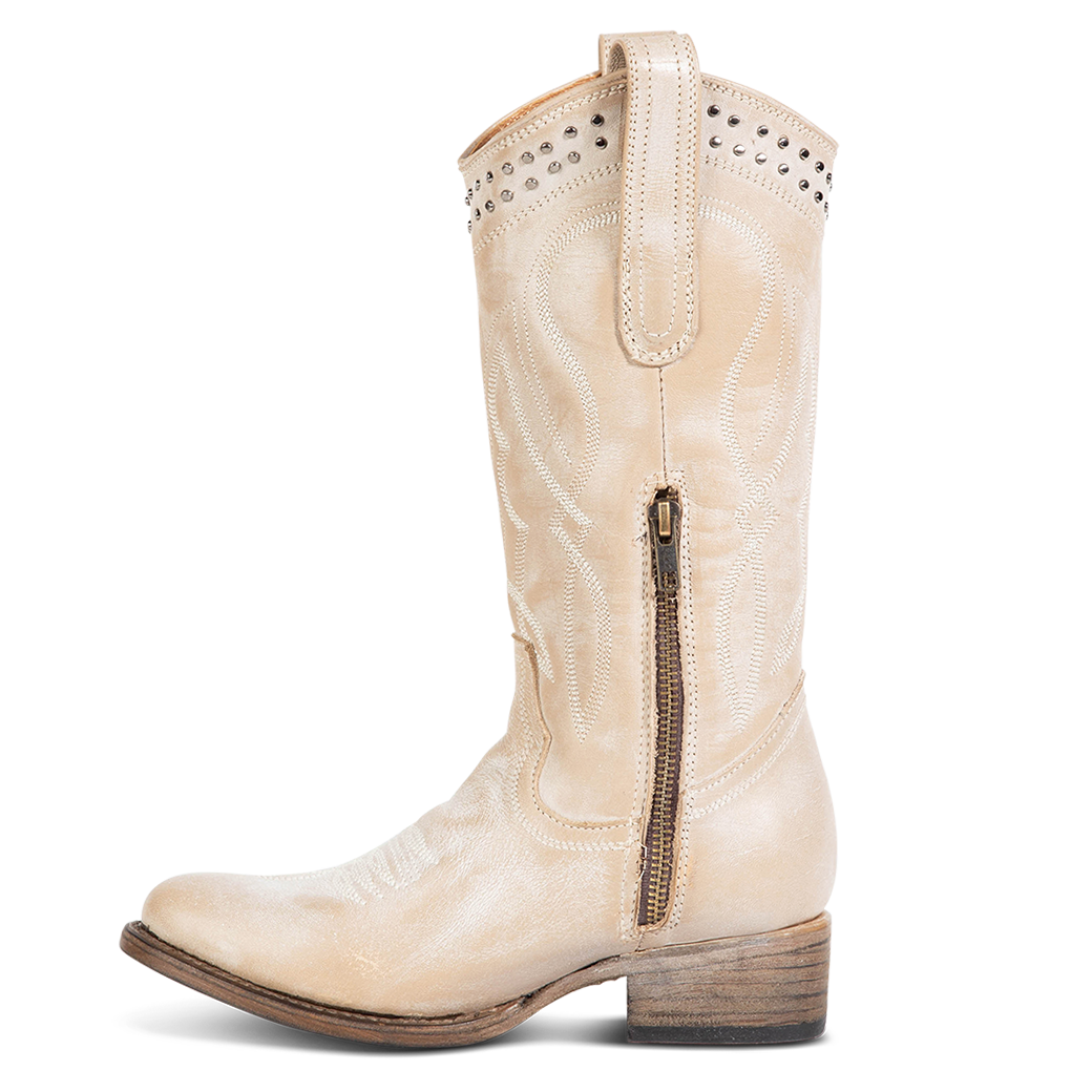Inside view showing inside zipper and pill straps with stud and stitch detailing on FREEBIRD women's Zion beige western mid boot