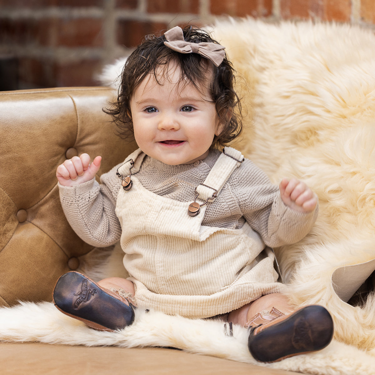 FREEBIRD infant baby coal dusty rose back lace detailing leather bootie with inside velcro closure lifestyle image