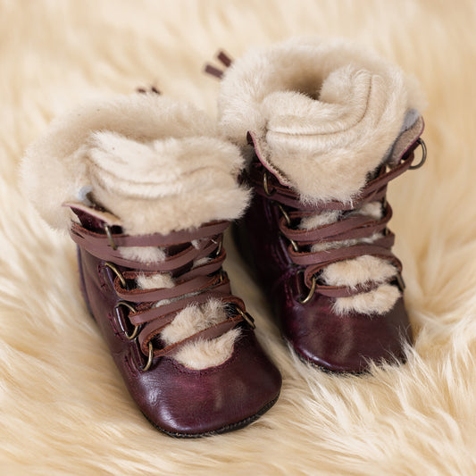 FREEBIRD infant baby Norway wine shearling lined leather bootie with front lacing lifestyle image