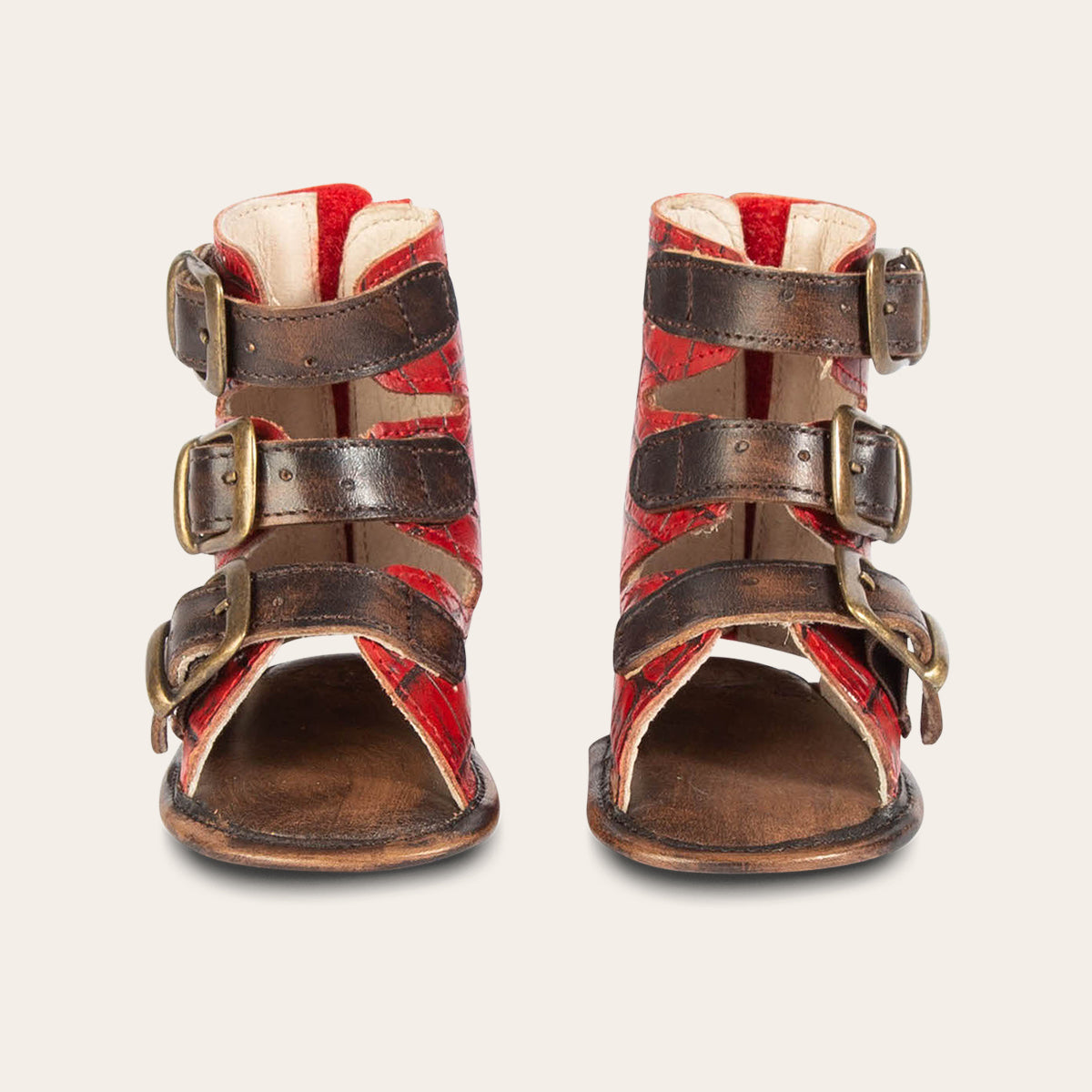 front view showing buckle fashion straps on FREEBIRD infant baby bond red croco sandal