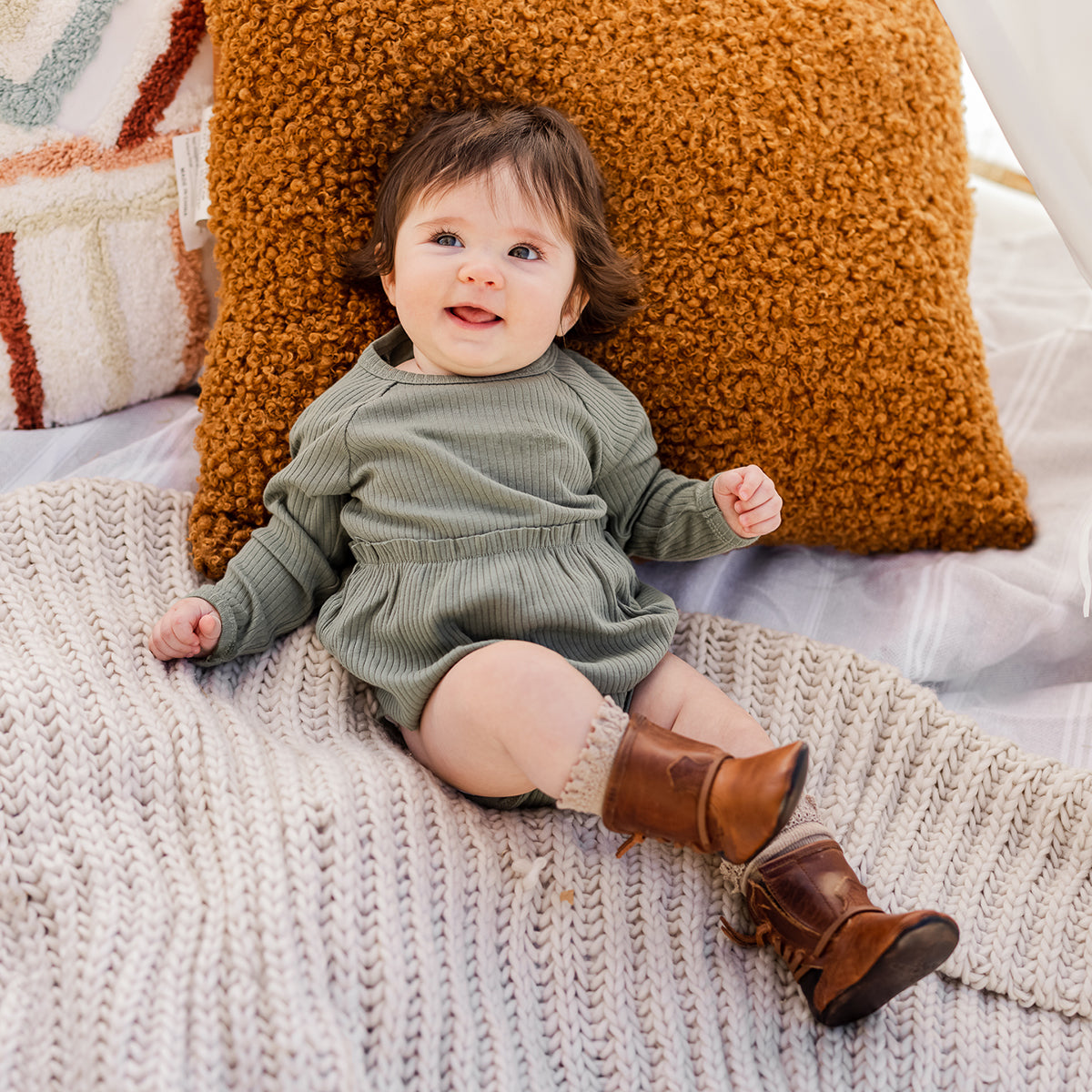 FREEBIRD infant baby coal cognac back lace detailing leather bootie with inside velcro closure lifestyle image