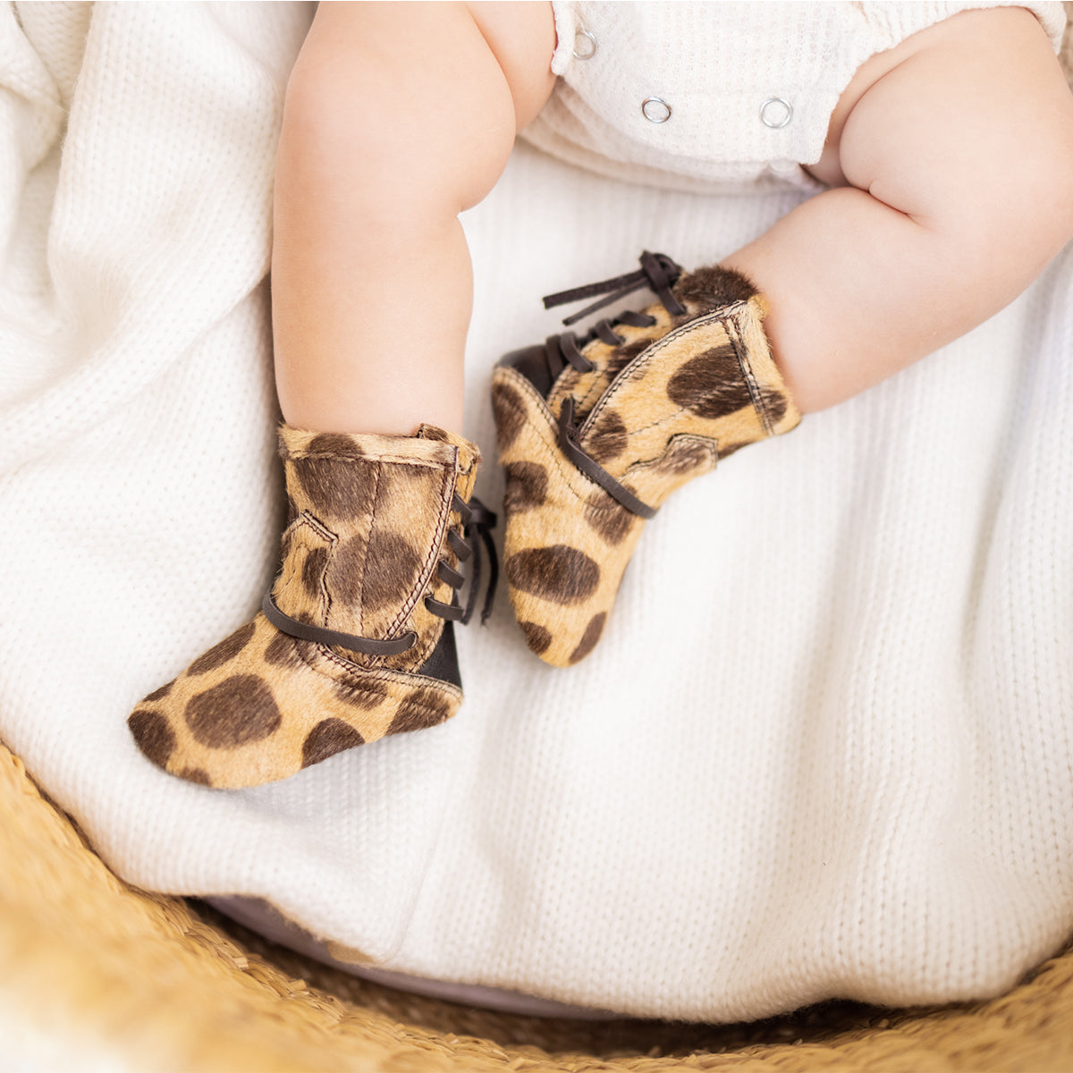 FREEBIRD infant baby coal leopard back lace detailing leather bootie with inside velcro closure lifestyle image