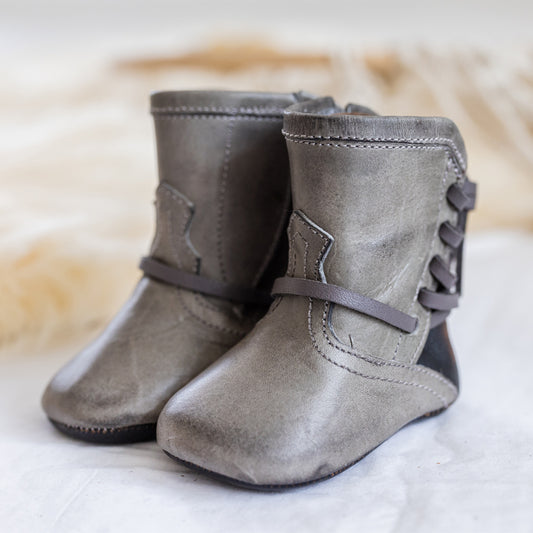 FREEBIRD infant baby coal stone back lace detailing leather bootie with inside velcro closure lifestyle image