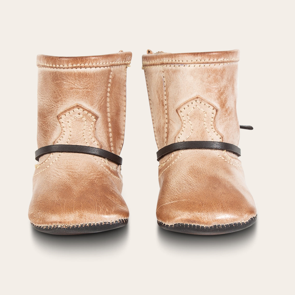 front view showing contrasting front lace detailing on FREEBIRD infant baby coal taupe leather bootie  