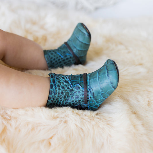 FREEBIRD infant baby coal turquoise croco back lace detailing leather bootie with inside velcro closure lifestyle image