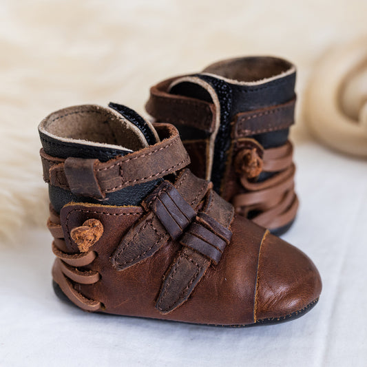 FREEBIRD infant baby crue cognac back lace detailing and side strap detailing leather bootie with inside velcro closure lifestyle image