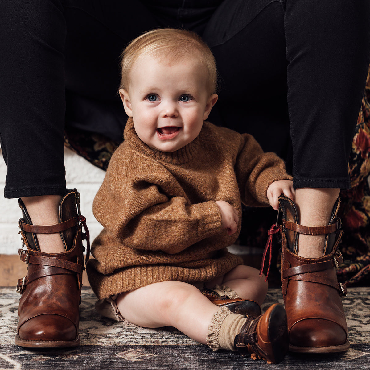 FREEBIRD infant baby crue cognac back lace detailing and side strap detailing leather bootie with inside velcro closure lifestyle image