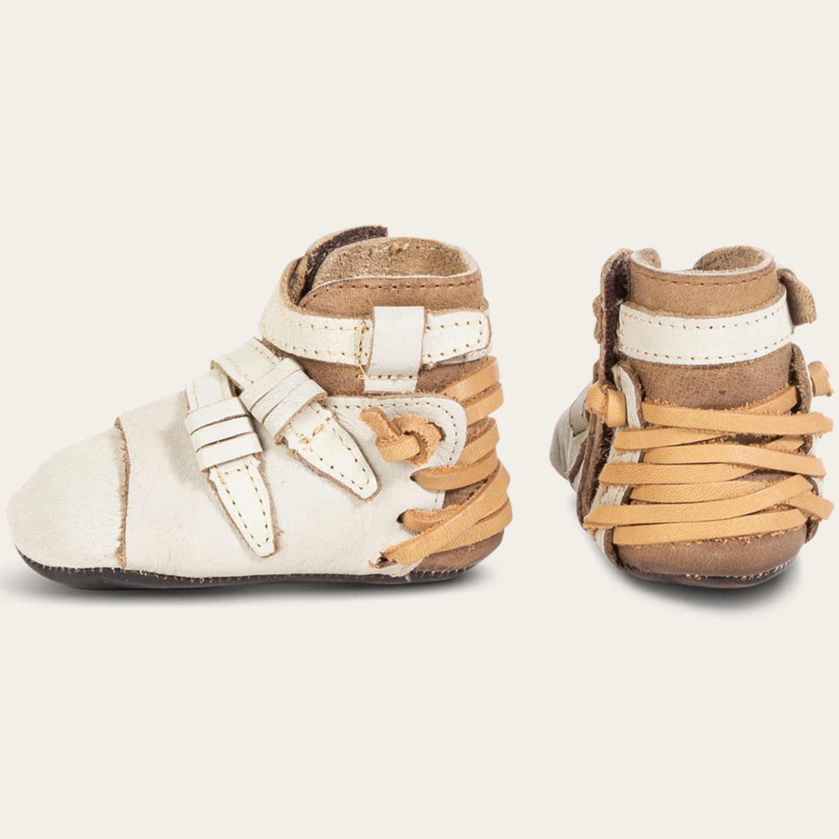 side and back view showing contrasting back lace and side strap detailing on FREEBIRD infant baby crue ice leather bootie