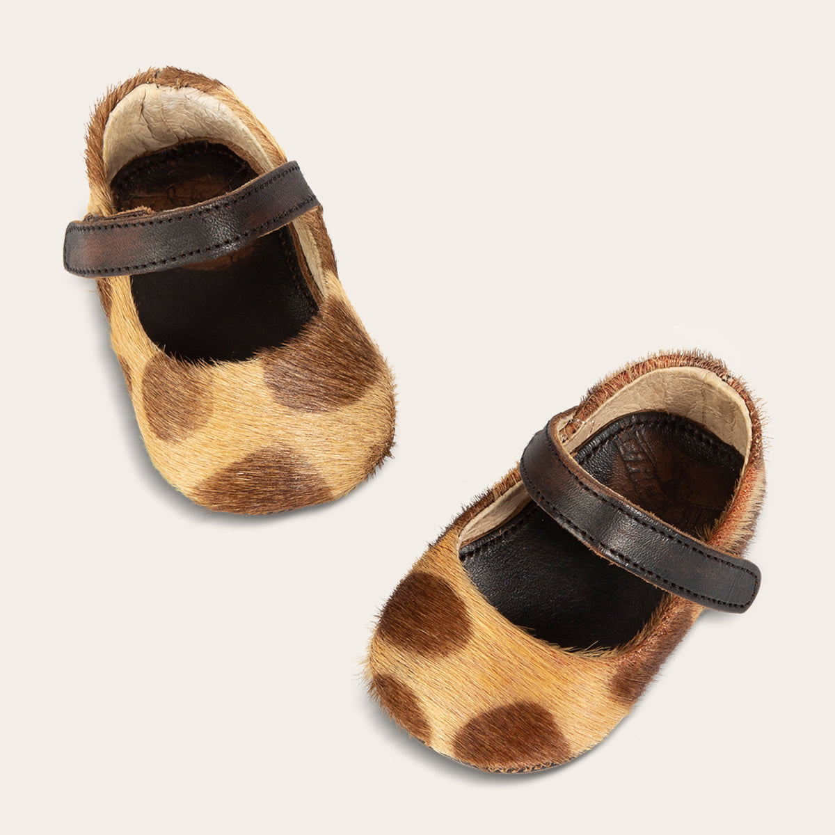 top view showing top leather strap on FREEBIRD infant baby Jane leopard leather shoe