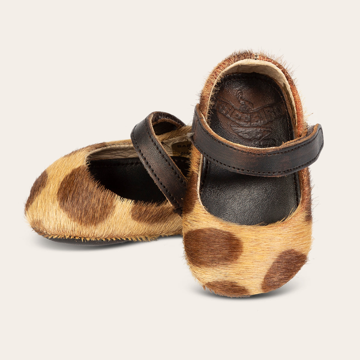 front view showing top leather strap on FREEBIRD infant baby Jane leopard leather shoe