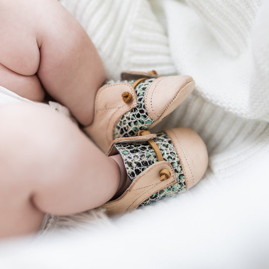 FREEBIRD infant baby Mabel turquoise multi leather shoe with decorative knotted leather lace and hidden inside elastic panel lifestyle image