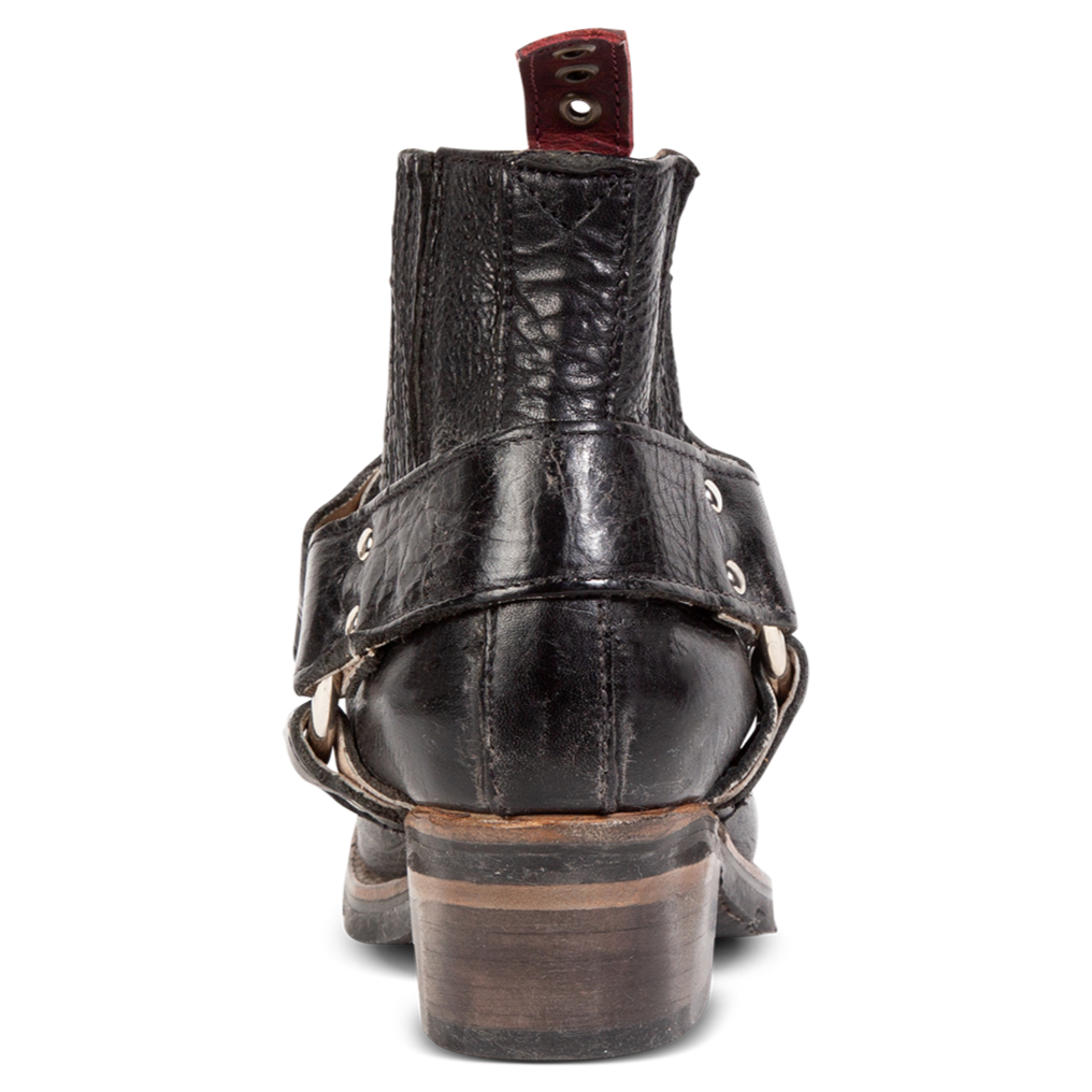 Back view showing leather ankle harness and red leather pull tab on FREEBIRD women's Whiskey black ankle bootie