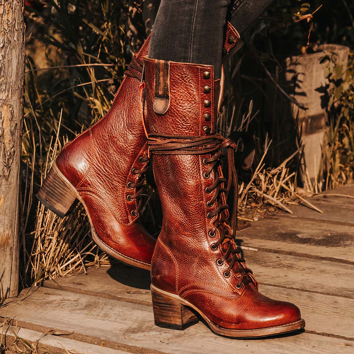 FREEBIRD women's Grany wine leather lace up front knee high boot with back zip closure