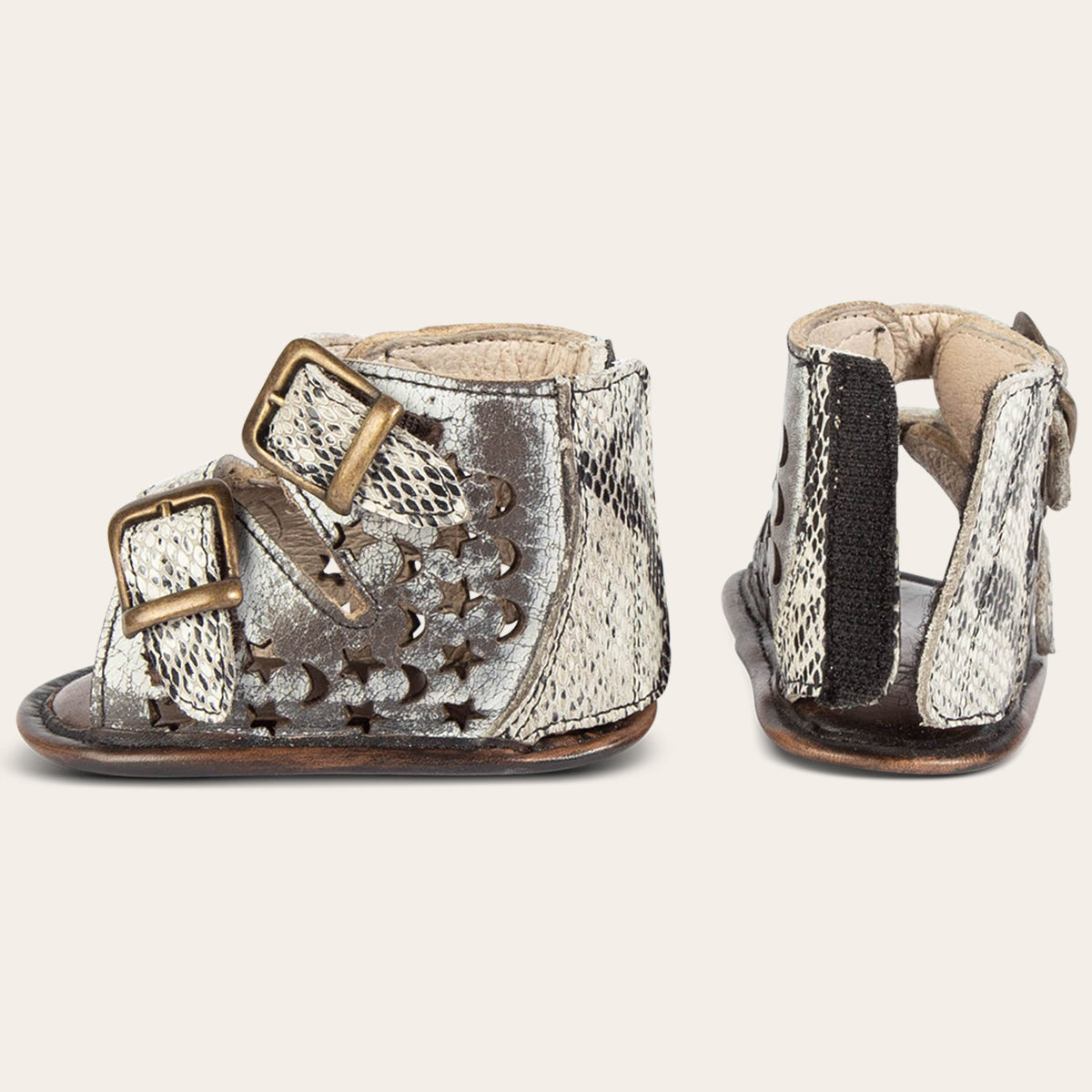 back and side view showing laser-cut leather, embossed fashion straps, back velcro panel on FREEBIRD infant baby teresa ice leather sandal
